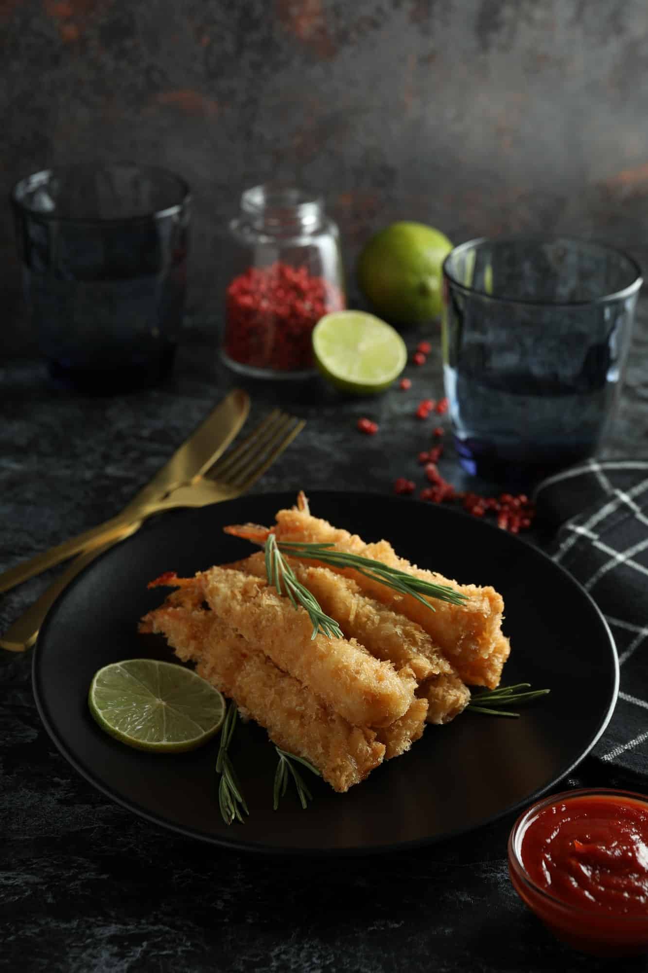 oncept-of-tasty-food-with-deep-fried-shrimp-on-dark-table.jpg